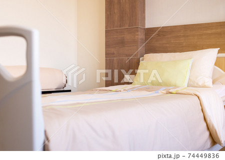 Empty sick bed for supporting patients at hospital room 74449836