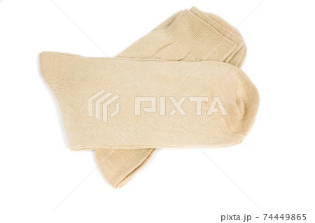 two pair beige mens socks on white background 74449865