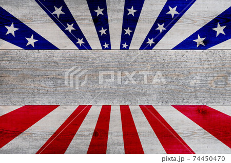 wooden planks painted with red and blue stripes and stars 74450470