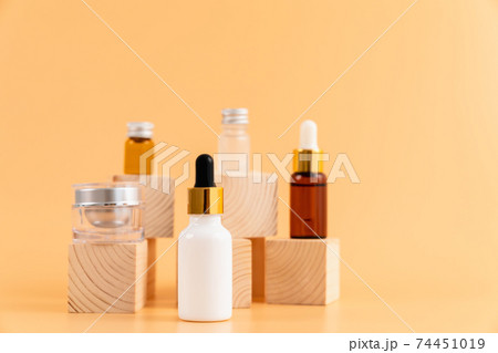 Medicine bottle placed, Blank label package for mockup on the orange background. Medicine bottle placed, Blank label package for mockup on the orange background. 74451019