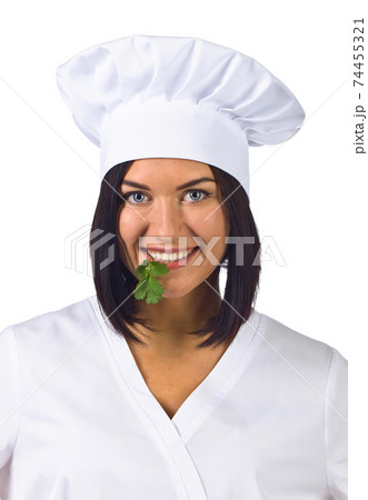 young woman in chef uniform with parsley isolated on white young woman in chef uniform with parsley isolated on white 74455321