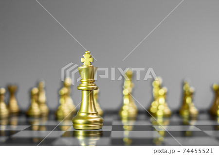 Gold Chess figure team (King, Queen, Bishop, Knight, Rook and Pawn) on Chessboard against opponent during battle. Strategy, Success, management, business planning, think, education and leader concept 74455521