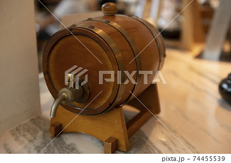 Small oak wine barrel on vintage background, food and drink 74455539