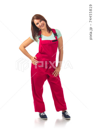 Attractive woman in red overalls, isolated on a white. 74455819