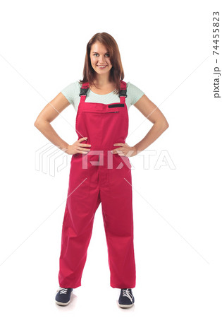 Young woman in red jumpsuit , isolated on white . 74455823