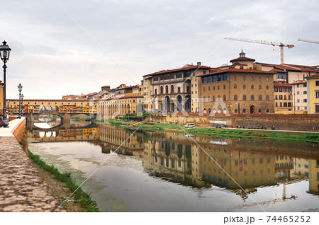 Ponte Vecchio over Arno river in Florence, Italy 74465252