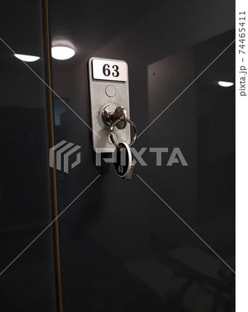 Key with a tag in the locker room of the sports club 74465411