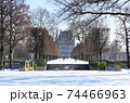 Paris, France - February 11th 2021: Paris under the snow at the Tuileries garden. 74466963