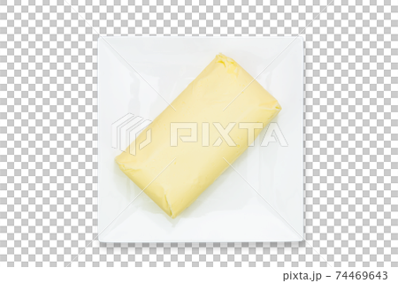 Top view of fresh organic butter block on the plate isolated on a white background in close-up. PNG file with transparent background. 74469643