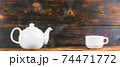 tea cup and pot on rustic wooden table, panoramic shot 74471772