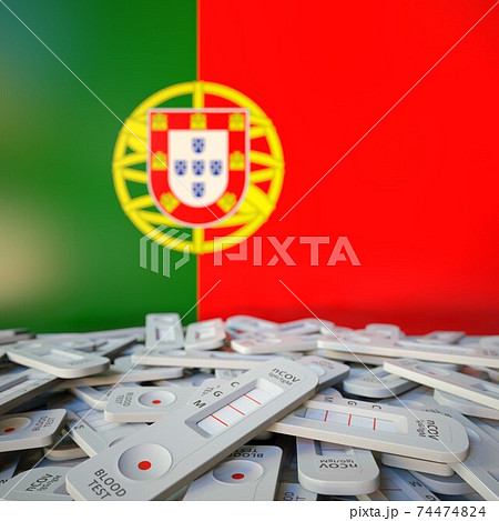 COVID-19 rapid antigen tests and flag of Portugal. Pandemic conceptual 3D rendering 74474824