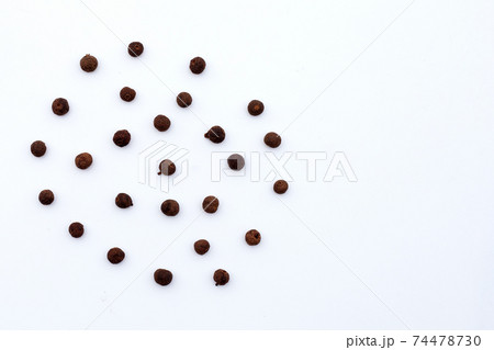 Allspice on white background. Copy space 74478730