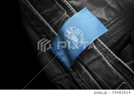 Tag on dark clothing in the form of the flag of the Food and agriculture organization 74482614