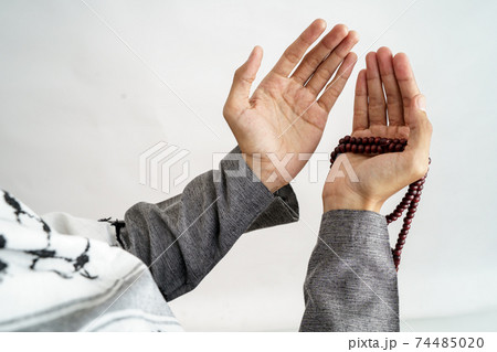 hand open arm while pray in islamic culture 74485020