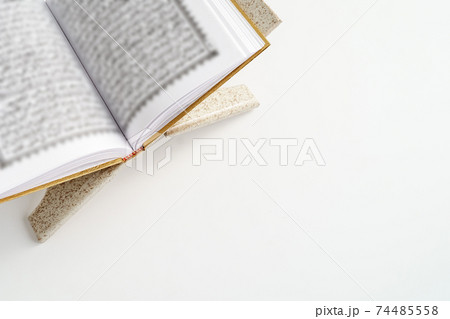 Islamic Holy Book Quran with prayer beads 74485558