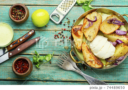 Fried potatoes in pan Fried potatoes in pan 74489650