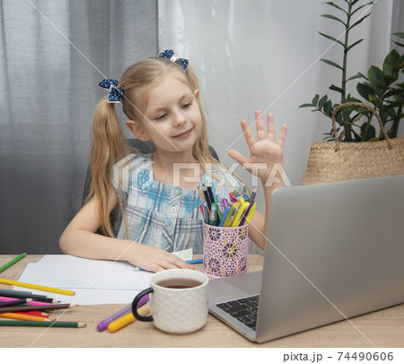 Cute girl doing homework Cute girl doing homework 74490606