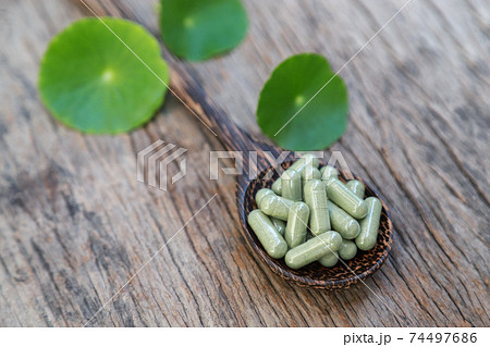 herbal medicine incapsule from organic herb for healthy eating  74497686