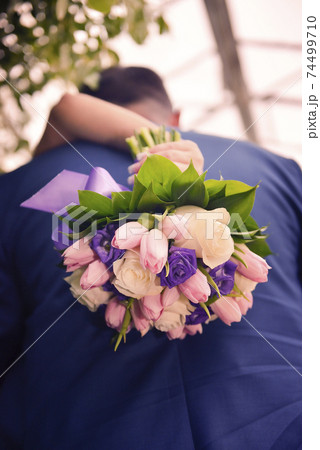 nice wedding bouquet in bride's hand 74499710