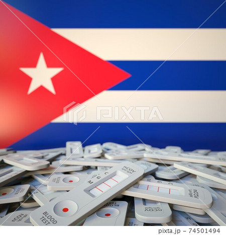 National flag of Cuba and multiple coronavirus antigen tests, public health conceptual 3D rendering 74501494