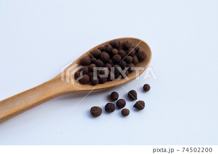 Allspice isolated on white background 74502200