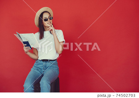 Stylish girl in a studio with 74502703