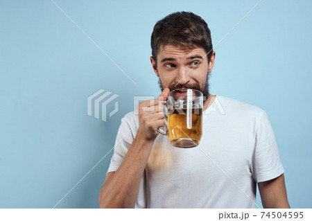 Drunk man beer mug fun white t-shirt lifestyle blue background 74504595