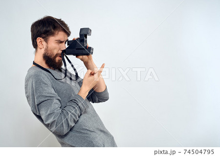 photographer with camera hobby technology studio lifestyle creative light background photographer with camera hobby technology studio lifestyle creative light background 74504795