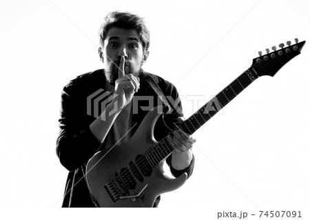 Musician with guitar rock star emotions entertainment modern performer Musician with guitar rock star emotions entertainment modern performer 74507091