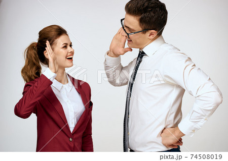 Work colleagues Business couple office officials team studio light background Work colleagues Business couple office officials team studio light background 74508019
