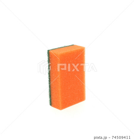 Orange sponge for washing dishes isolated on white background Orange sponge for washing dishes isolated on white background 74509411
