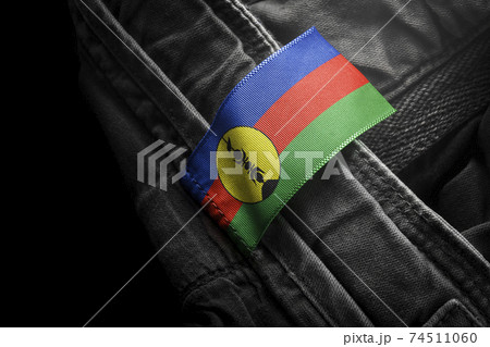 Tag on dark clothing in the form of the flag of the New Caledonia 74511060