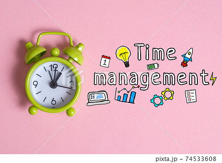 Time management concept - round clock on a pink background with the inscription and icons. Time management concept - round clock on a pink background with the inscription and icons. 74533608