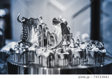 Object printed on metal 3d printer close-up 74533681