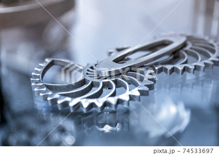 Object printed on metal 3d printer close-up 74533697