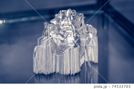 Object printed on metal 3d printer close-up Object printed on metal 3d printer close-up 74533703