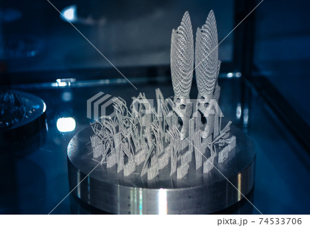 Object printed on metal 3d printer close-up Object printed on metal 3d printer close-up 74533706