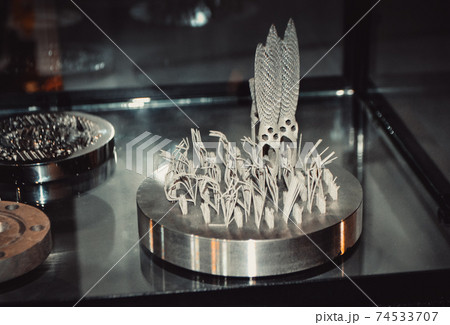 Object printed on metal 3d printer close-up Object printed on metal 3d printer close-up 74533707