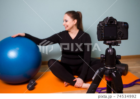 Creating video content with fitness workouts to do at home 74534992