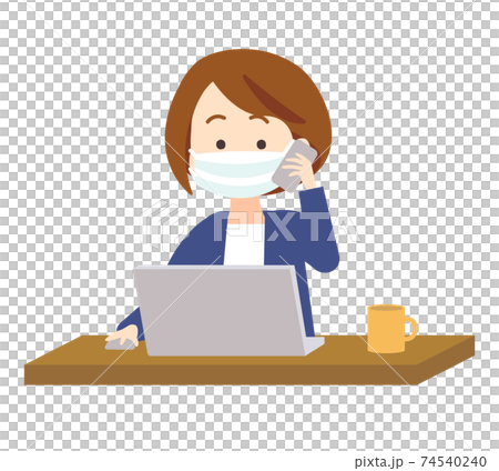 A woman in a mask who operates a computer while making a phone call with a smartphone A woman in a mask who operates a computer while making a phone call with a smartphone 74540240