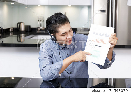 Screen of businessman talking with video call, video conference meeting at home. Business people working at home with online video call looking at camera 74543079