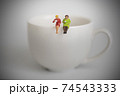 Two women sipping coffee together 74543333