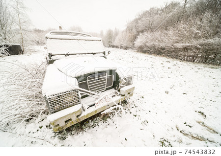 abandoned car with snow abandoned car with snow 74543832