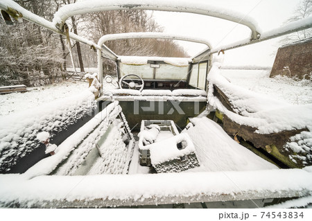abandoned car with snow abandoned car with snow 74543834