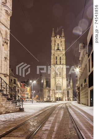 Saint Bavo Cathedral of Ghent during snowfall Saint Bavo Cathedral of Ghent during snowfall 74543856