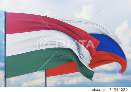 Waving Russian flag and flag of Hungary. Closeup view, 3D illustration. 74544029