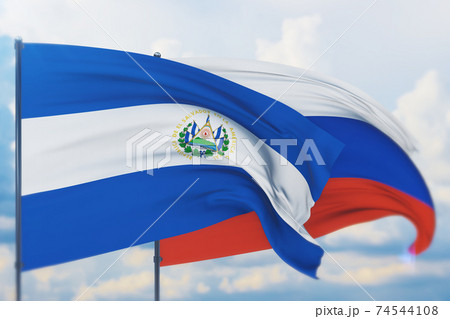 Waving Russian flag and flag of El Salvador. Closeup view, 3D illustration. 74544108