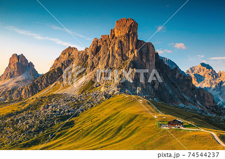 Alpine pass with spectacular mountain peaks, Giau pass, Dolomites, Italy Alpine pass with spectacular mountain peaks, Giau pass, Dolomites, Italy 74544237