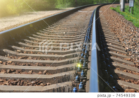 Railways tracks and sunbeams. Railways tracks and sunbeams. 74549336