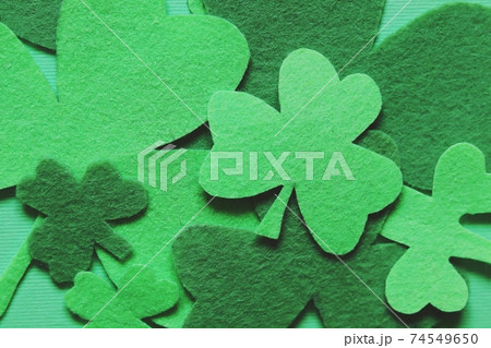 Saint Patrick's Day, decorative clover leaves, top view, background for congratulations Saint Patrick's Day, decorative clover leaves, top view, background for congratulations 74549650